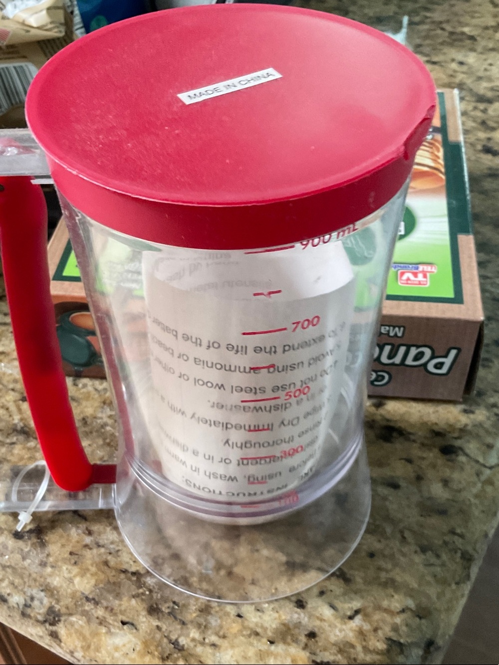 Clear Plastic pancake Batter Dispenser with Red Lid and Handle